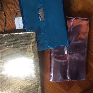 A bundle Forever 21 clutches or  individuals
